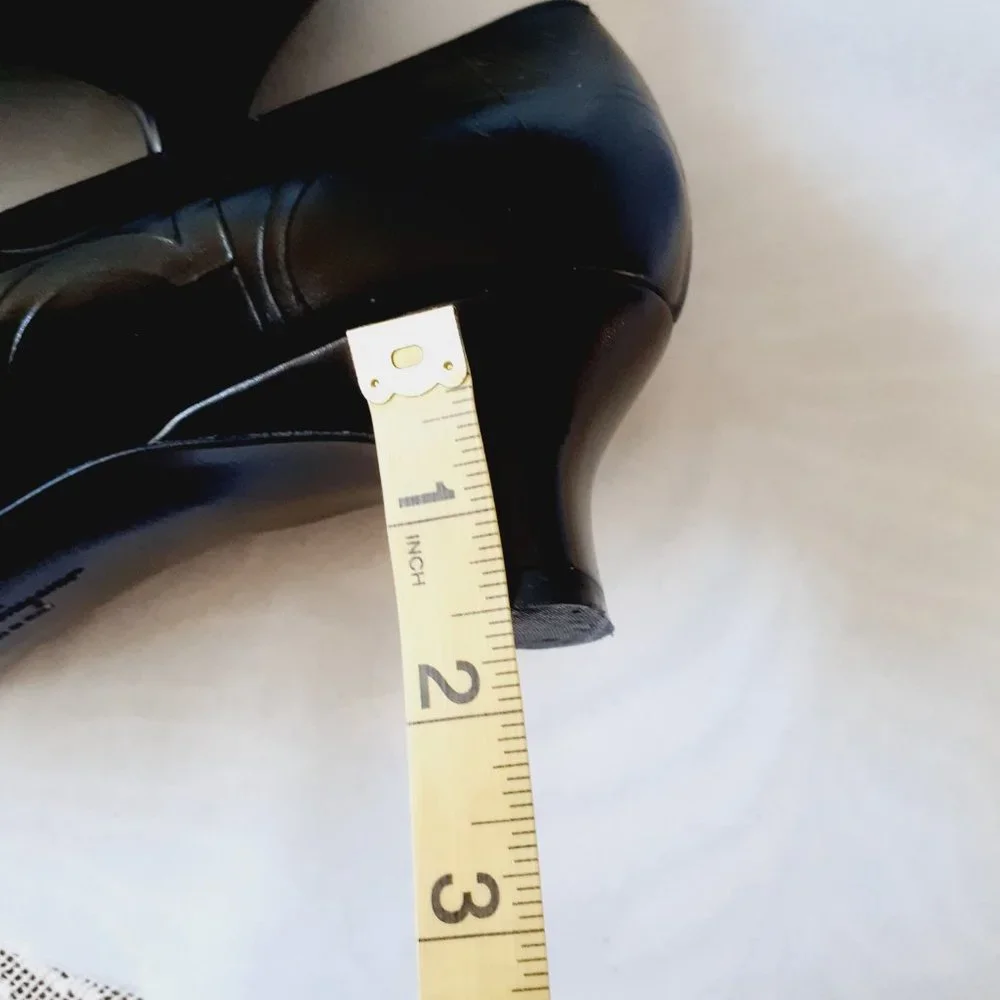 Ferragamo Gancini Symbol Embossed Pump